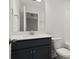 Small bathroom with dark vanity, toilet and shower at 519 Eagleview Dr, Moncks Corner, SC 29461