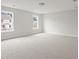 Spacious bedroom with neutral carpet and large windows at 519 Eagleview Dr, Moncks Corner, SC 29461