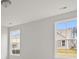 Spacious bedroom with neutral walls and large windows offering natural light at 519 Eagleview Dr, Moncks Corner, SC 29461
