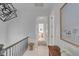 Bright hallway with hardwood floors and a large framed print at 70 Warren St, Charleston, SC 29403