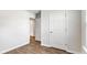 Simple bedroom with wood floors and closet at 104 River Hill Rd, Goose Creek, SC 29445