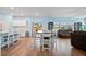 Open concept dining area with hardwood floors at 107 Cotton Blossom Way, Summerville, SC 29485