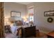 Cozy bedroom with a comfortable bed and charming decor at 1104 Hitchfield Ln, Awendaw, SC 29429