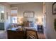 Bright bedroom featuring a tranquil atmosphere and ensuite bathroom access at 1104 Hitchfield Ln, Awendaw, SC 29429