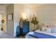 Charming bedroom with dresser, bed, and unique wall decor at 1104 Hitchfield Ln, Awendaw, SC 29429