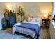 Bright bedroom with a comfortable bed and lovely decor at 1104 Hitchfield Ln, Awendaw, SC 29429
