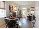 Charming dining area with round table and metal chairs near living room at 1104 Hitchfield Ln, Awendaw, SC 29429