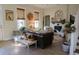 Cozy living room with leather sofa and fireplace at 1104 Hitchfield Ln, Awendaw, SC 29429