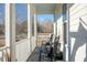 Relaxing screened porch with rocking chairs overlooking backyard at 1104 Hitchfield Ln, Awendaw, SC 29429