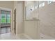 Large walk in shower with marble tile and glass enclosure at 1149 Reserve Ln, Awendaw, SC 29429