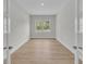 A bright bedroom with a view of nature from the windows at 1149 Reserve Ln, Awendaw, SC 29429