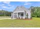 Charming single-Gathering home with a 2-car garage, manicured lawn and elegant landscaping at 1149 Reserve Ln, Awendaw, SC 29429