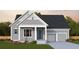 Gray two-story house with two-car garage, landscaping, and a front porch at 1149 Reserve Ln, Awendaw, SC 29429