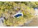 Community pool surrounded by lush trees near the water at 1240 Creek Watch Trce, Seabrook Island, SC 29455