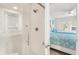 Bright bathroom with walk-in shower and white subway tiles at 1240 Creek Watch Trce, Seabrook Island, SC 29455