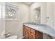Bathroom with granite countertop and wood cabinets at 1240 Creek Watch Trce, Seabrook Island, SC 29455