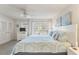 King bedroom with private balcony and ceiling fan at 1240 Creek Watch Trce, Seabrook Island, SC 29455