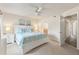 Main bedroom with king-size bed and access to a balcony at 1240 Creek Watch Trce, Seabrook Island, SC 29455
