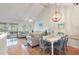 Bright dining area with hardwood floors and seating for four at 1240 Creek Watch Trce, Seabrook Island, SC 29455