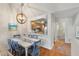 Bright dining area with view into kitchen and bathroom at 1240 Creek Watch Trce, Seabrook Island, SC 29455