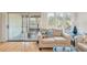 Living area featuring a comfy couch and access to a porch at 1240 Creek Watch Trce, Seabrook Island, SC 29455