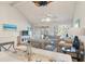 Open living space with hardwood floors and access to screened porch at 1240 Creek Watch Trce, Seabrook Island, SC 29455