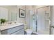 Modern bathroom with gray vanity, walk-in shower, and white toilet at 135 River Hill Rd, Goose Creek, SC 29445
