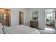 Bedroom with a double bed, dresser, and access to a sitting area at 135 River Hill Rd, Goose Creek, SC 29445