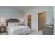 Bedroom with a double bed, nightstands, and access to a bathroom and closet at 135 River Hill Rd, Goose Creek, SC 29445