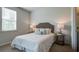 Bedroom with queen bed, nightstands, and large window at 147 River Hill Rd, Goose Creek, SC 29445