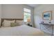 Bedroom with a queen-size bed and side table at 147 River Hill Rd, Goose Creek, SC 29445