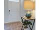 Bright entryway with a table, lamp, and plant at 147 River Hill Rd, Goose Creek, SC 29445