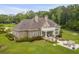Luxury home with large backyard, patio, and pond at 1484 Old Rosebud Trl, Awendaw, SC 29429