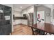 Modern basement kitchenette with stainless steel appliances and white cabinets at 1484 Old Rosebud Trl, Awendaw, SC 29429
