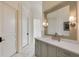 Elegant bathroom with a large mirror, double vanity, and marble flooring at 1484 Old Rosebud Trl, Awendaw, SC 29429