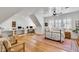 Large bedroom with a workspace, hardwood floors, and a ceiling fan at 1484 Old Rosebud Trl, Awendaw, SC 29429