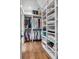 Large walk-in closet with ample hanging and shelving space at 1484 Old Rosebud Trl, Awendaw, SC 29429