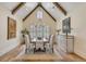 Elegant dining room with hardwood floors and a rustic chandelier at 1484 Old Rosebud Trl, Awendaw, SC 29429