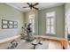 Bright home gym with an elliptical machine and plenty of floor space at 1484 Old Rosebud Trl, Awendaw, SC 29429