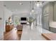 Open concept kitchen with view of living room and white countertops at 1484 Old Rosebud Trl, Awendaw, SC 29429