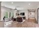 Open recreation room with hardwood floors and access to a hallway at 1484 Old Rosebud Trl, Awendaw, SC 29429