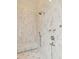 Spa-like shower with marble tile and built-in bench at 1484 Old Rosebud Trl, Awendaw, SC 29429