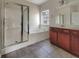 Bathroom with soaking tub, shower, and wood vanity at 158 Mayfield Dr, Goose Creek, SC 29445