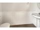 Clean bathroom with pedestal sink and white wainscoting at 158 Mayfield Dr, Goose Creek, SC 29445