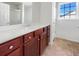 Bathroom boasting a vanity with wood cabinets and tiled floor at 158 Mayfield Dr, Goose Creek, SC 29445