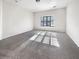 Simple bedroom with plush carpet and window at 158 Mayfield Dr, Goose Creek, SC 29445