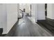 Long hallway with hardwood floors and staircase at 158 Mayfield Dr, Goose Creek, SC 29445