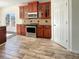 Kitchen with stainless steel appliances and wood cabinets at 158 Mayfield Dr, Goose Creek, SC 29445