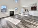 Spacious living room with hardwood floors, fireplace, and large windows at 158 Mayfield Dr, Goose Creek, SC 29445