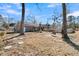 Large backyard with brick house and deck at 211 Brailsford Rd, Summerville, SC 29485